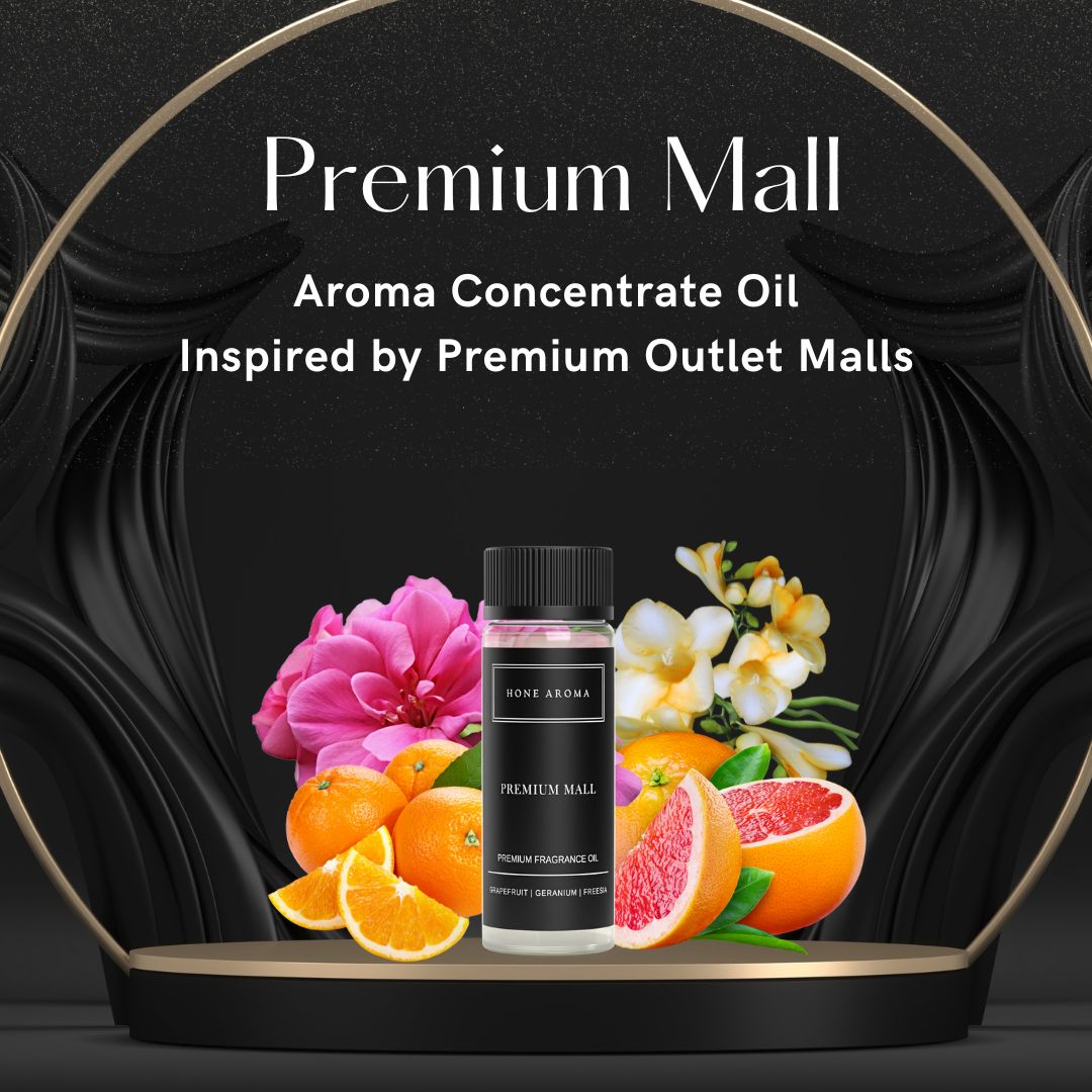 Hone Aroma Premium Mall Essential Aroma Oil bottle surrounded by orange, grapefruit, and floral elements