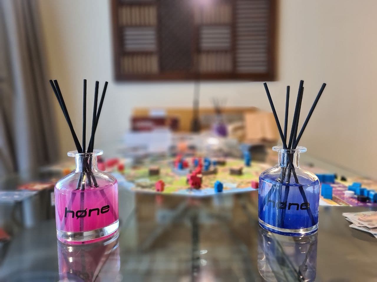 2 hone reed diffusers on the table